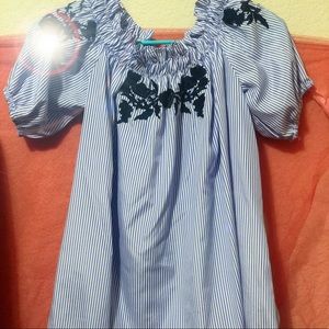 Striped blue off the shoulder top.
